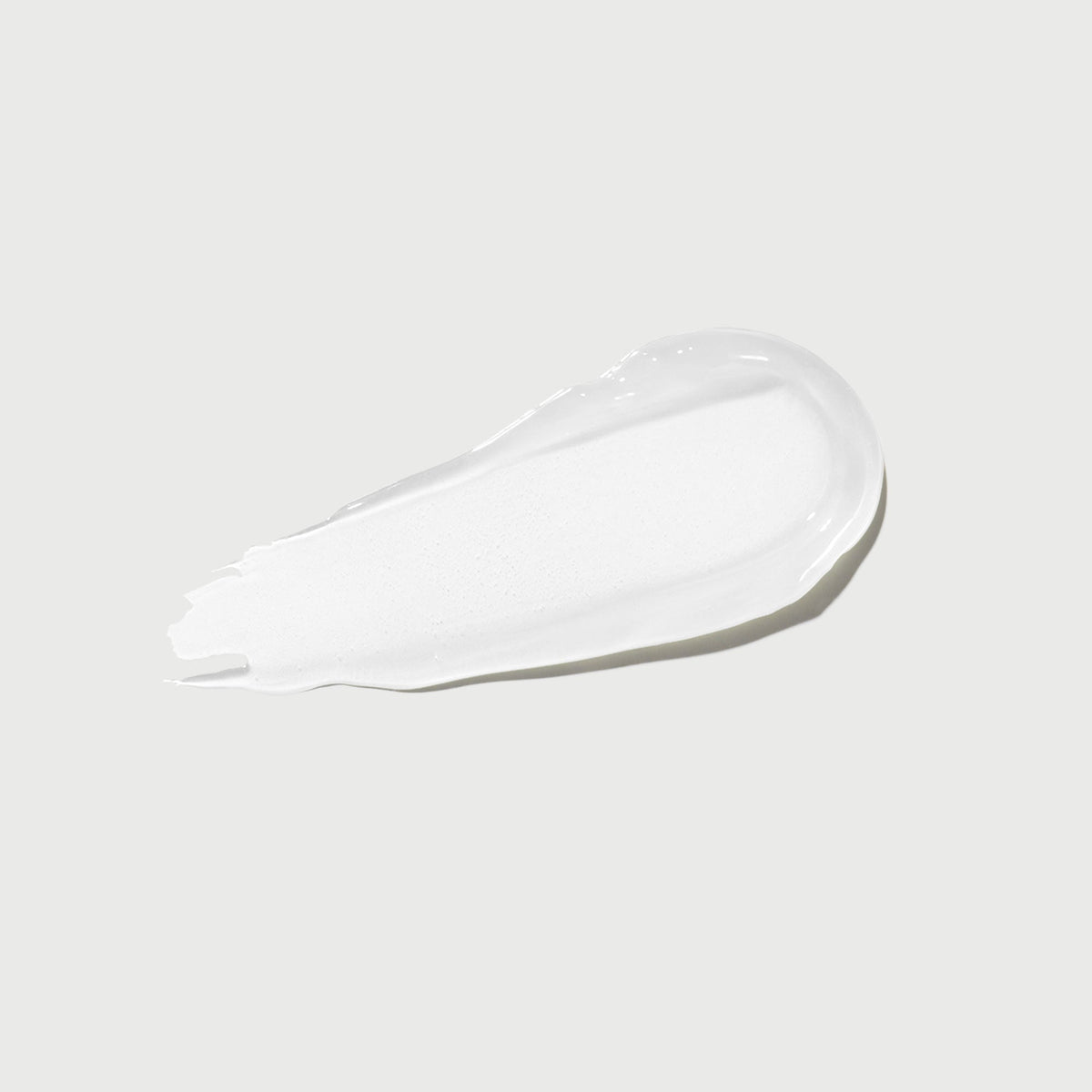 phyto-glow-lip-balm-clear-z7 NATR-60066-Swatch-Phyto-Glow-Clear-bonebkgd.jpg