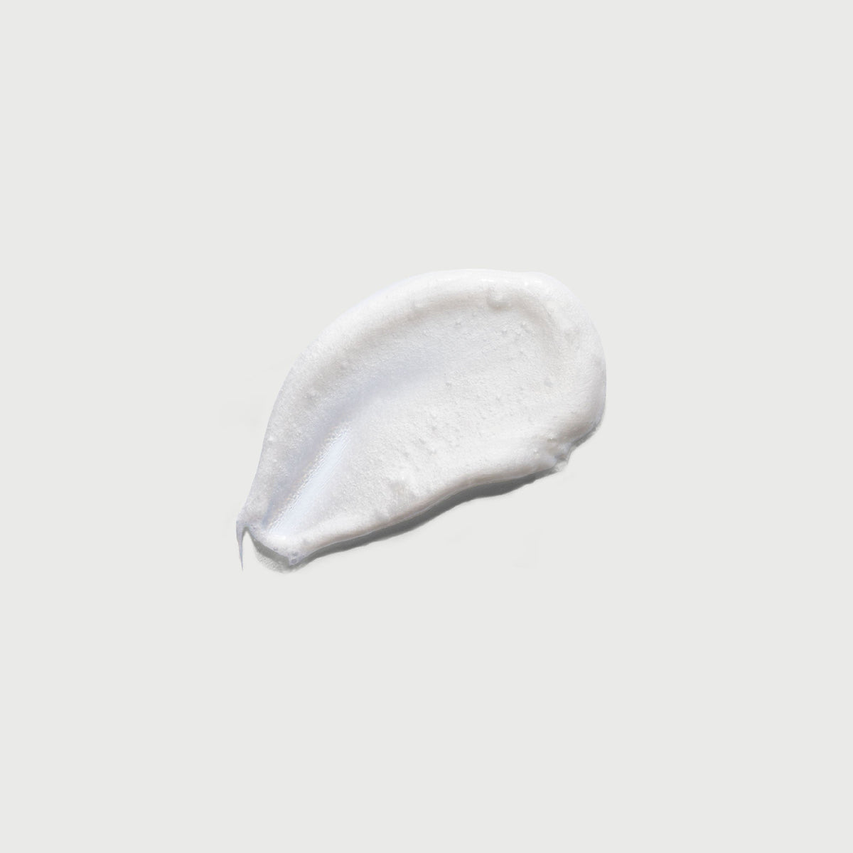 the-smoother-glycolic-acid-exfoliating-body-wash-z1 NATR-40002-Swatch-The-Smoother-Glycolic-Acid-Exfoliating-Body-Wash-bonebkgd.jpg