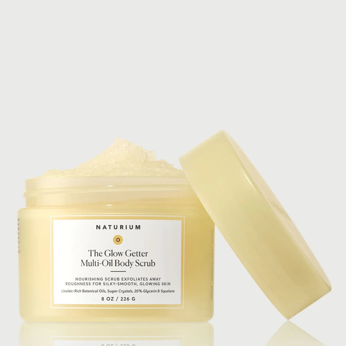 the-glow-getter-multi-oil-body-scrub-c0 NATR-40028-GlowGetter-Multi-Oil-Body-Scrub-Front-CapOff-bonebkgd.webp
