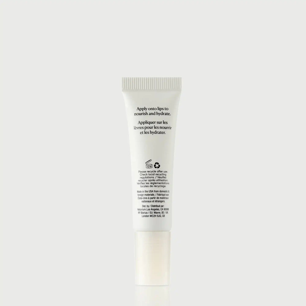 phyto-glow-lip-balm-clear-z7 NATR-60066_PhytoGlow_Clear_primary_capon_back-bonebkgd.webp